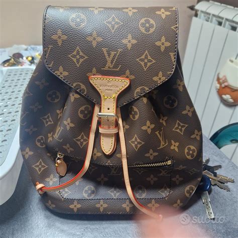 zainetto louis vuitton uomo falso|false Louis Vuitton stitches.